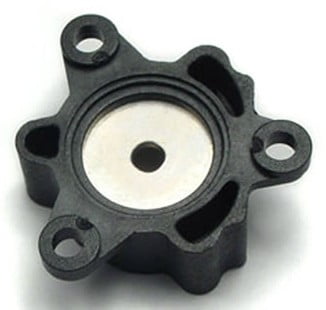 Metal insert molded valve component.