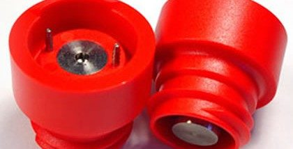 Insert molded titanium contacts.